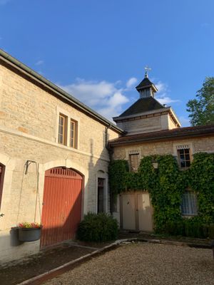 an image of a building with a clock tower on top of it