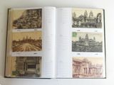 an open book with pictures of buildings on it