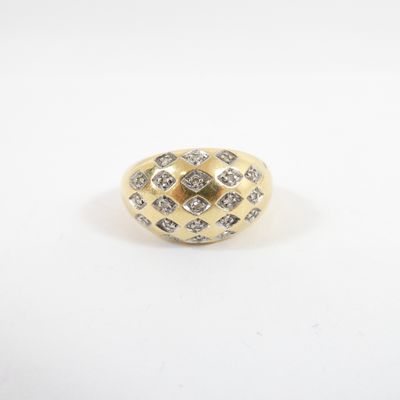 a yellow gold ring with diamonds on a white background