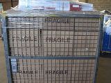 a cart with a lot of boxes on it in a warehouse
