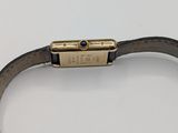 an image of a close up of a wrist with a watch on it
