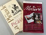 two books that are sitting on a table