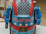 a toy robot that is sitting on a table