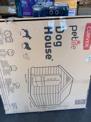 boîte en carton avec, à l'intérieur, l'image d'un chien assis par terre