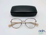 the glasses are laying on the table next to the case