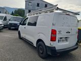 a white van that is parked in a parking lot