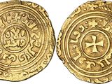 a gold coin with a cross on the front and a cross on the back