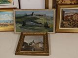 three framed pictures of a landscape and a painting of a castle