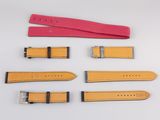 a set of four yellow and pink leather watch straps
