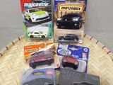 a lot of different toy cars on a table