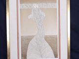 painting of a woman in a white dress in a gold frame on a black background