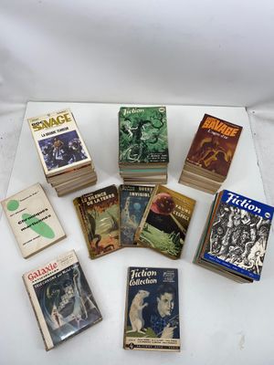 a lot of books that are sitting on a table
