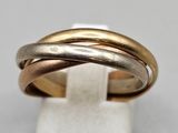 a gold and silver ring with three different colored bands
