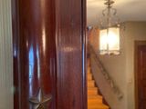 a wooden door with a star on it in a house