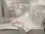 many pieces of plastic sitting on top of a table