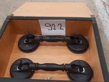a wooden box with two black handles and a price tag on it