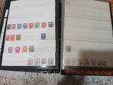 a binder with stamps on it sitting on a table