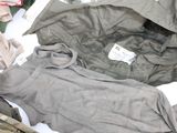 a pile of clothing that is sitting on the ground