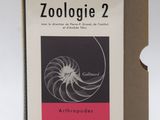 a book with a picture of a spiral design on it