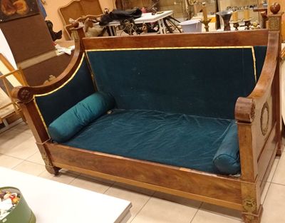 a couch that is sitting in the middle of a room