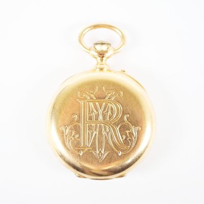 une image représentant une montre de poche en or sur laquelle sont gravés les mots « amour » et « espoir »