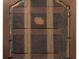 a picture of a wooden frame with a window on it