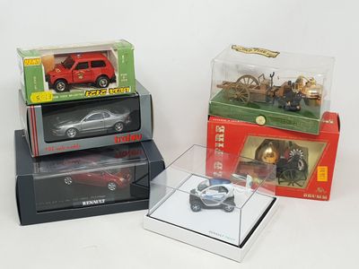 three boxes of toy cars sitting on top of each other
