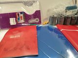 a lot of folders that are sitting on a table
