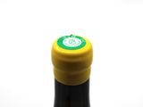 a bottle of wine that is sitting on a table