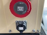 an image of a machine with a red button on it