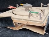 a small model of a boat on a table