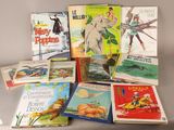 de nombreux livres pour enfants posés sur une table
