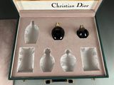 christian dior perfume bottles in a box on a table