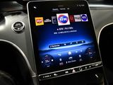 an image of a car dashboard with a tablet on it