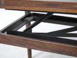 a wooden table with a glass top and a drawer underneath it