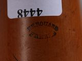 a close up of a baseball bat with a tag on it