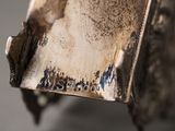 a close up of a metal object with rust on it
