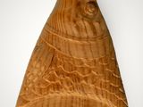 an image of a wooden sculpture of a fish