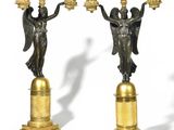 pair of antique bronze figurines of angels on pedestals