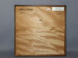 a picture of a picture of a welcome sign on the wall