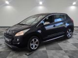 a picture of a black car parked on a checkered floor