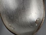 a spoon that is sitting on top of a table