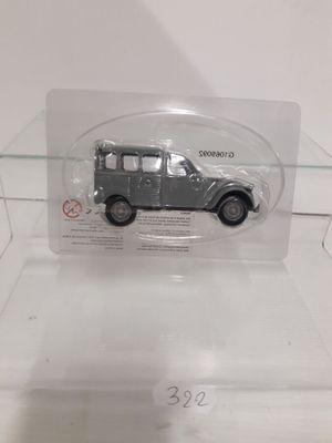 a plastic display case with a toy car in it