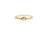 a close up of a gold ring on a white background
