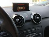 a car dashboard with a digital clock on the dash
