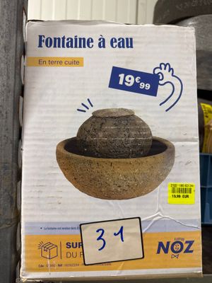 une boîte en carton sur laquelle est représenté un bol