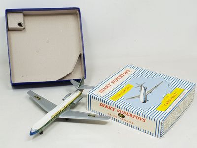 a small model of an airplane in a box