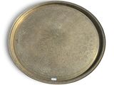 an image of a metal tray with a circular design on it