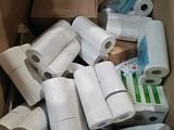 many rolls of toilet paper in a cardboard box
