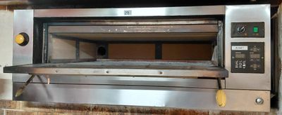 an image of a stainless steel oven in a kitchen